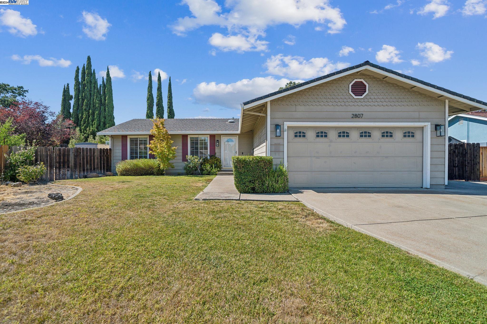 2807 Winthrop Avenue San Ramon, CA 94583 - Photo 1 of 1 a front view of a house with a yard and garage