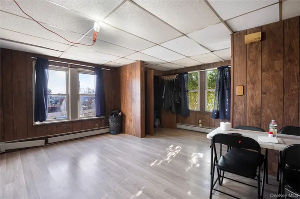 a kitchen with a refrigerator and stove