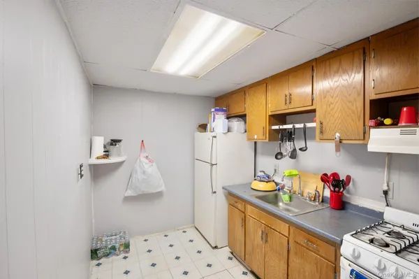 a bathroom with a toilet and a sink