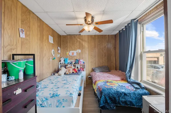 a very nice looking open kitchen with stainless steel appliances granite countertop a sink and a refrigerator