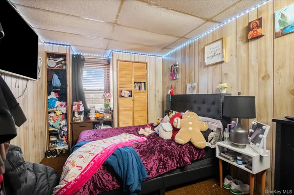 a white bath tub sitting next to a shower curtain