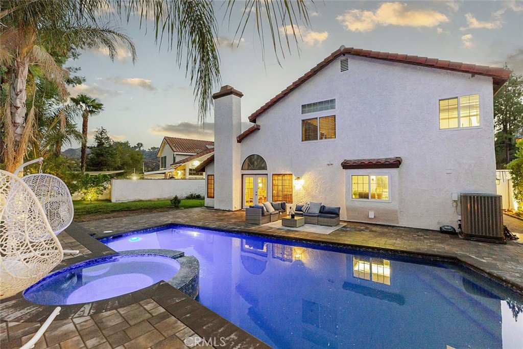 25010 Foxtail Court Stevenson Ranch, CA 91381 - Photo 12 of 64 a view of swimming pool with outdoor seating