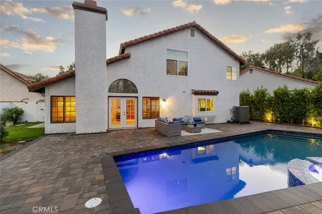 a front view of a house with outdoor space