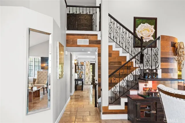 a view of an entryway with a chandelier