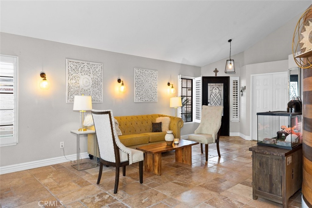 25010 Foxtail Court Stevenson Ranch, CA 91381 - Photo 22 of 64 a living room with furniture and a window