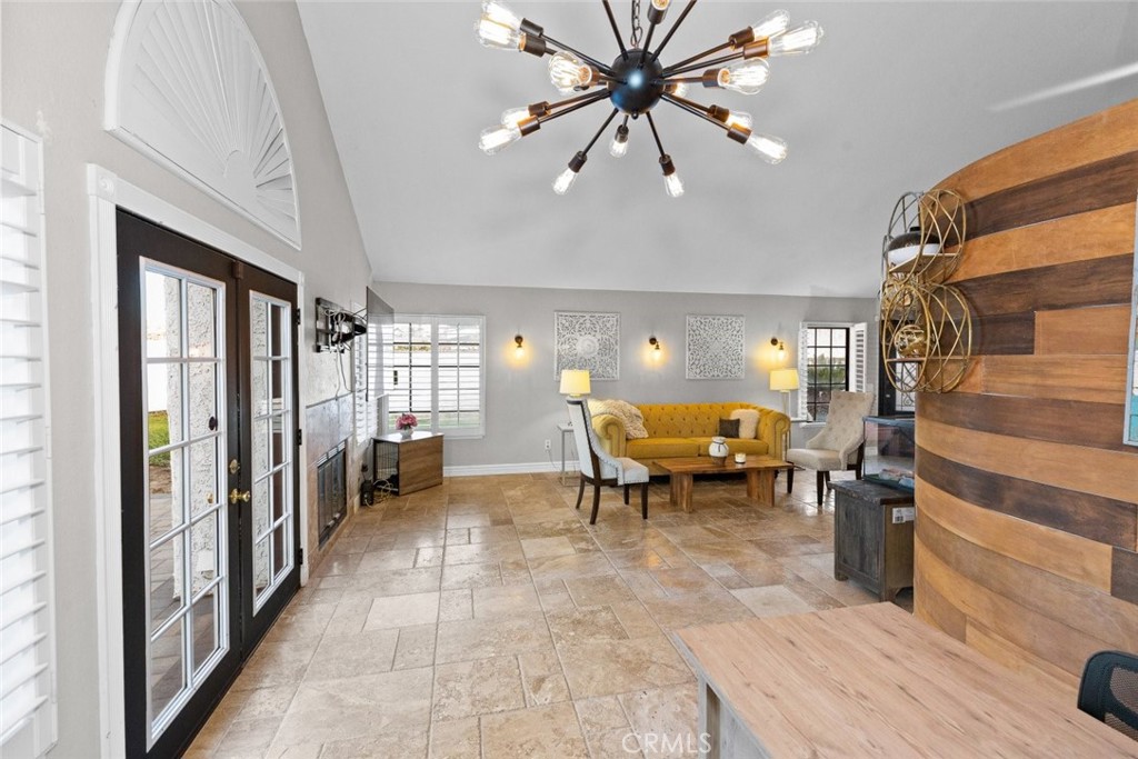 25010 Foxtail Court Stevenson Ranch, CA 91381 - Photo 23 of 64 a view of living room filled with furniture and a chandelier