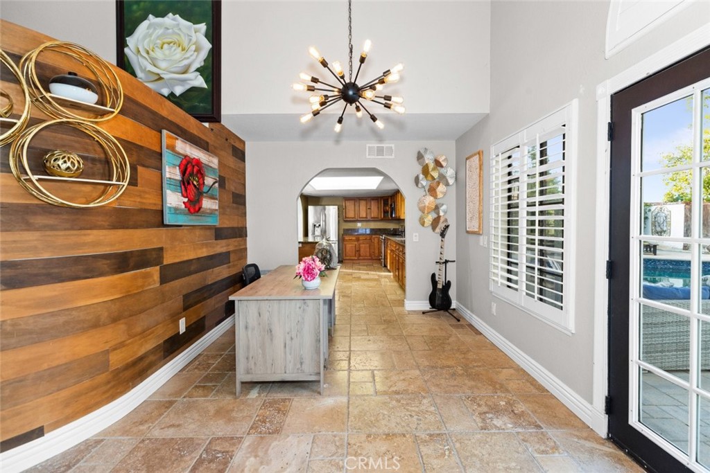 25010 Foxtail Court Stevenson Ranch, CA 91381 - Photo 24 of 64 a view of an entryway with a chandelier
