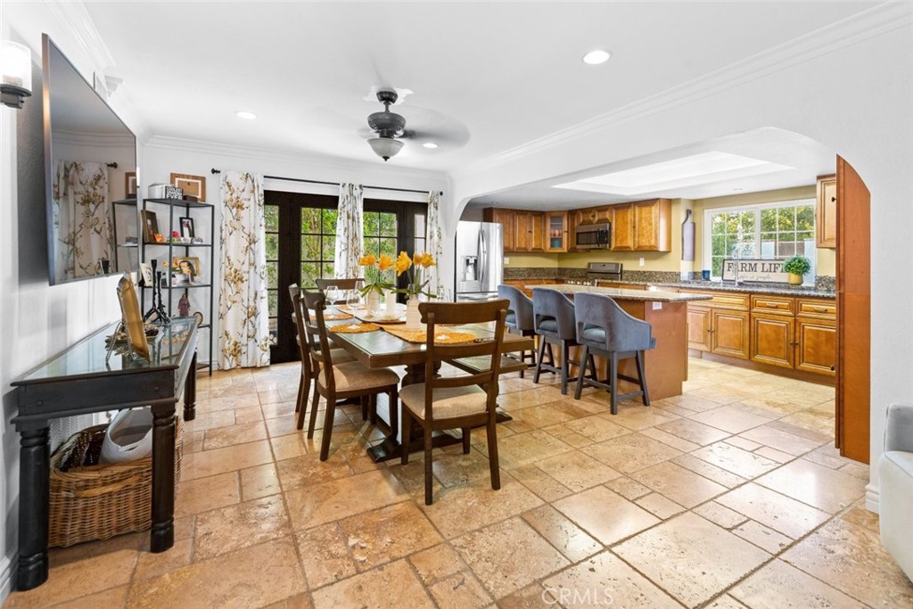 25010 Foxtail Court Stevenson Ranch, CA 91381 - Photo 31 of 64 a view of a dining hall with furniture and chandelier