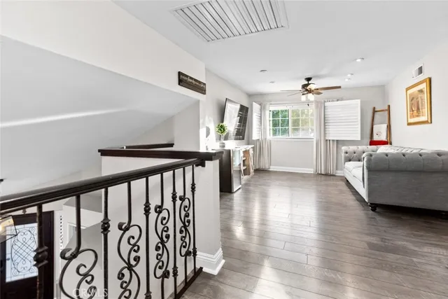 a bathroom with a sink toilet and a mirror