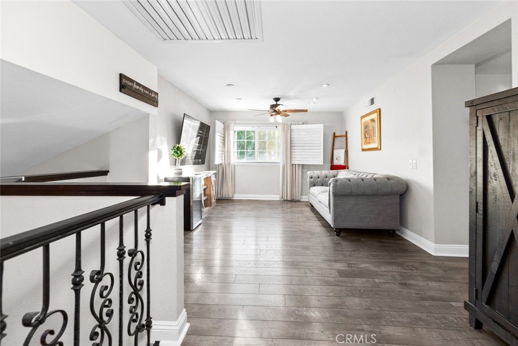 25010 Foxtail Court Stevenson Ranch, CA 91381 - Photo 35 of 64 a living room with furniture and a wooden floor