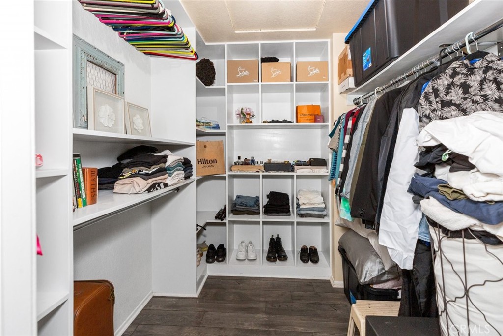 25010 Foxtail Court Stevenson Ranch, CA 91381 - Photo 39 of 64 a view of cabinets and wooden floor