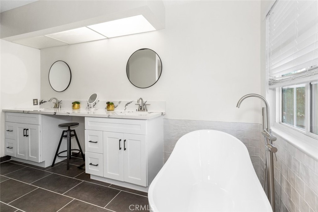 25010 Foxtail Court Stevenson Ranch, CA 91381 - Photo 42 of 64 a utility room with sink dryer and washer