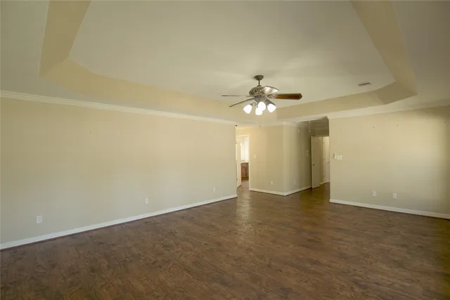 an empty room with a bathroom
