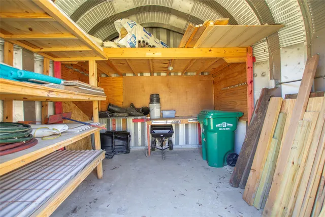 a view of a patio with a dining table and chairs