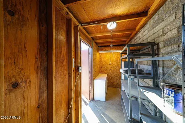a storage room with washing machine