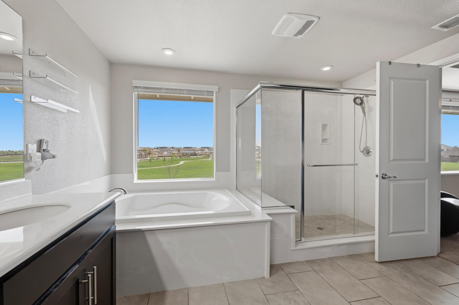 2012 Van Ruiten Drive Lodi, CA 95242 - Photo 31 of 49 a bathroom with a bathtub and a sink
