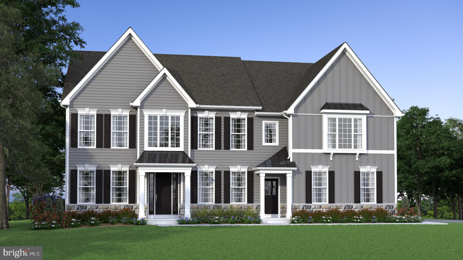 129 Ayshire Drive, Unit RITTENHOUSE Middletown, DE 19709 - Photo 2 of 8 front view of a house with a yard