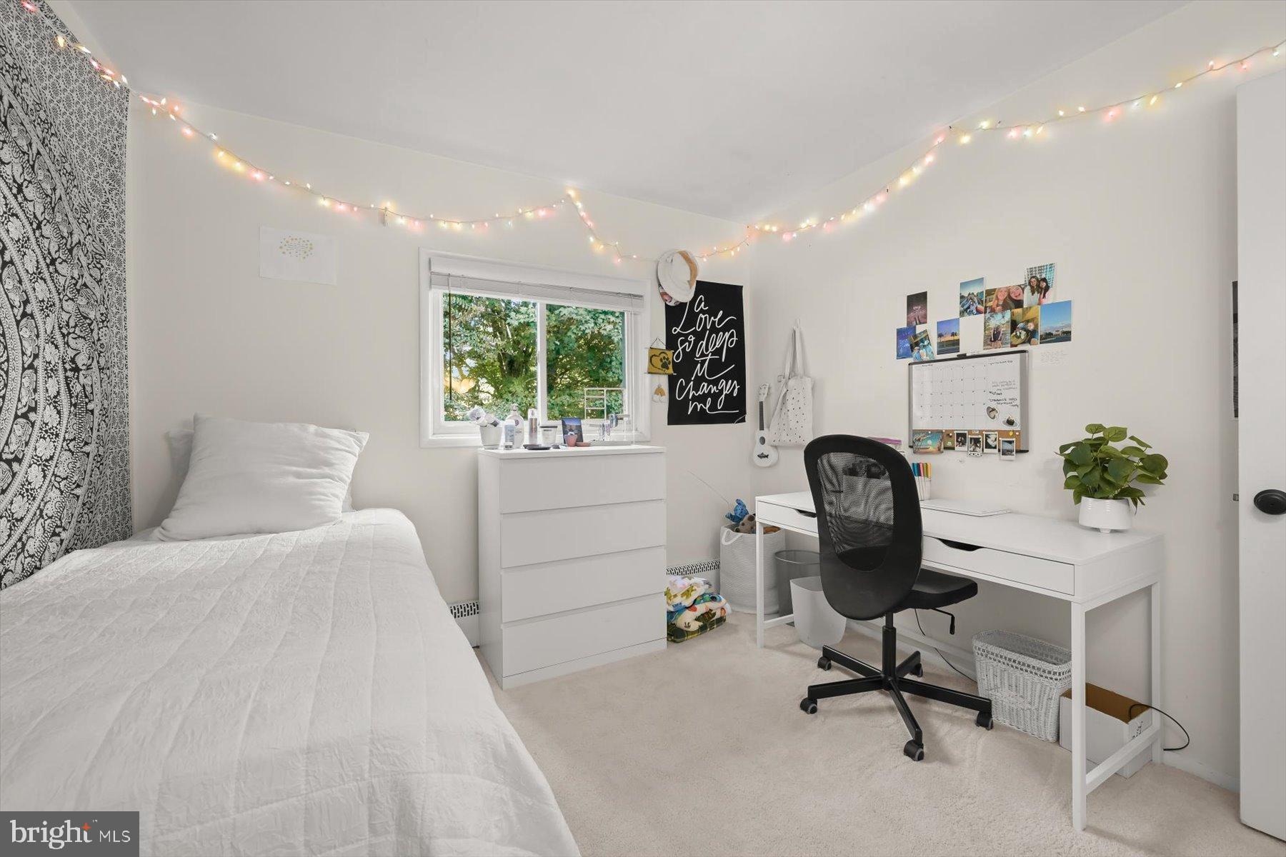 9233 Spring Valley Road Ellicott City, MD 21043 - Photo 20 of 45 a view of a workspace with furniture and a window