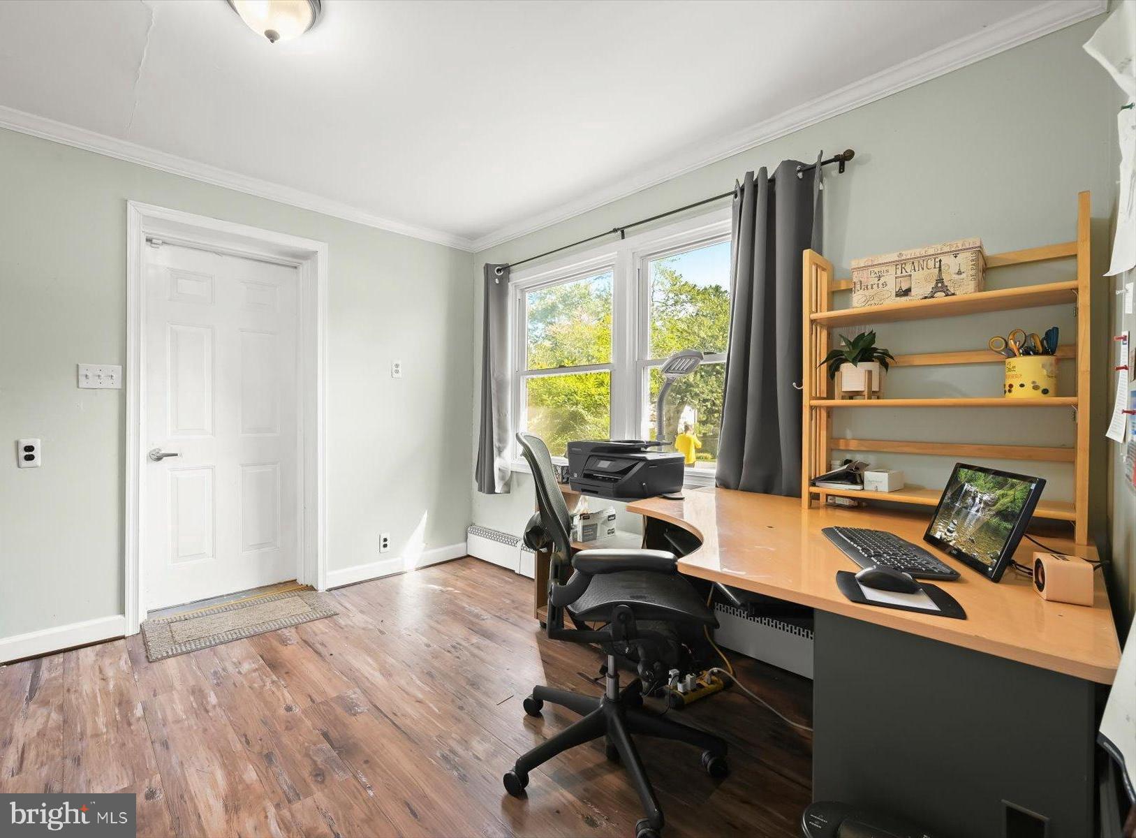 9233 Spring Valley Road Ellicott City, MD 21043 - Photo 29 of 45 a workspace with wooden floor