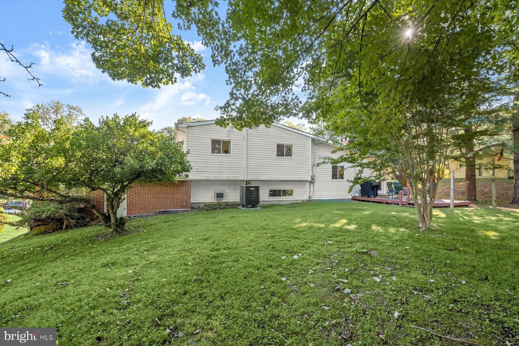 9233 Spring Valley Road Ellicott City, MD 21043 - Photo 36 of 45 a view of a house with backyard