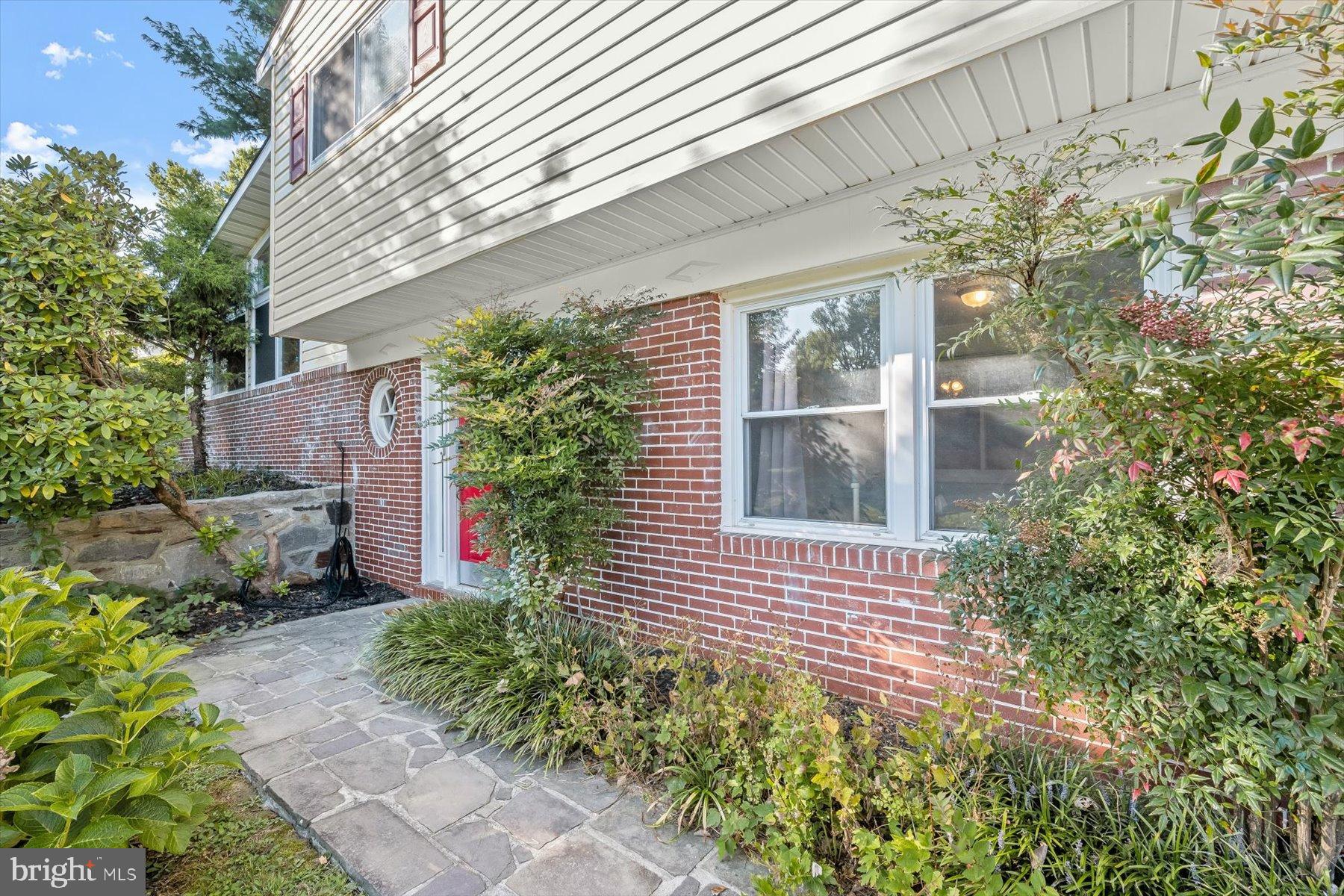 9233 Spring Valley Road Ellicott City, MD 21043 - Photo 41 of 45 a house that has a potted plant on it