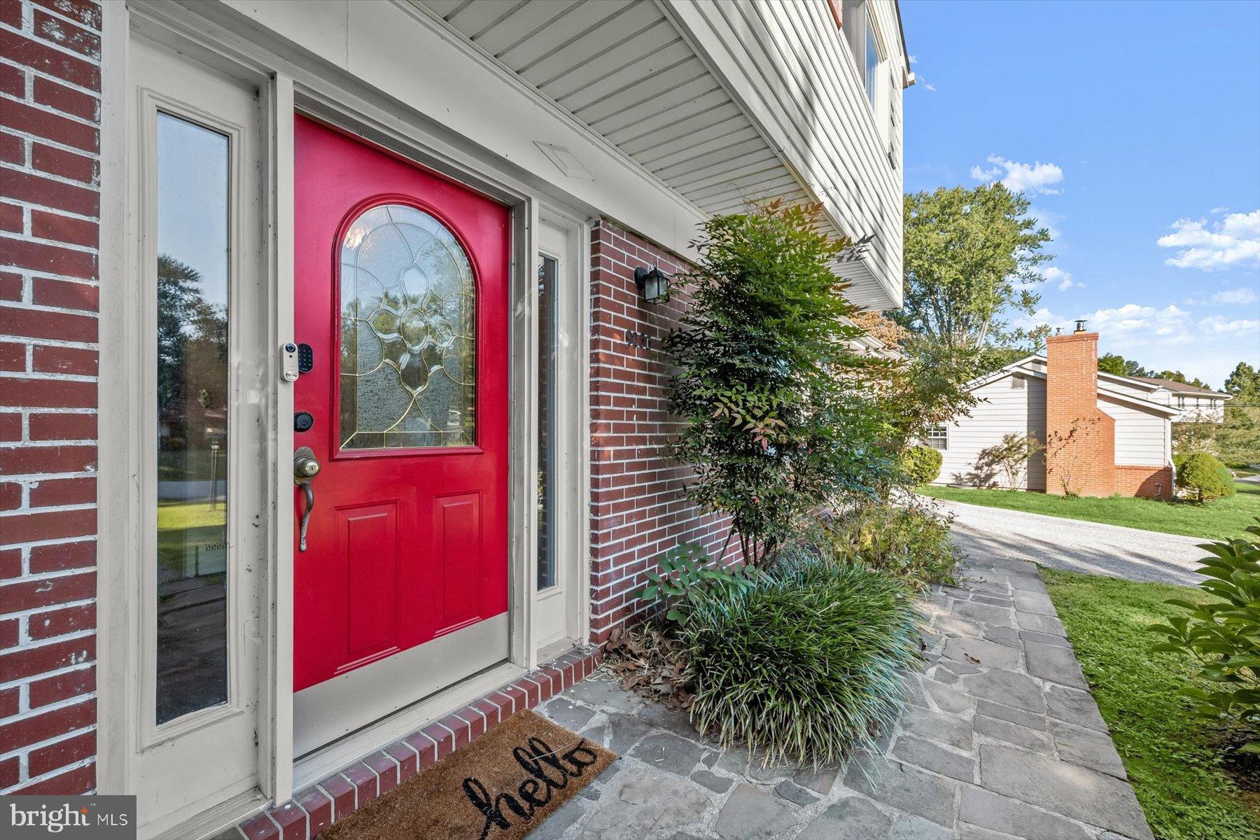 9233 Spring Valley Road Ellicott City, MD 21043 - Photo 43 of 45 a view of a red door of the house