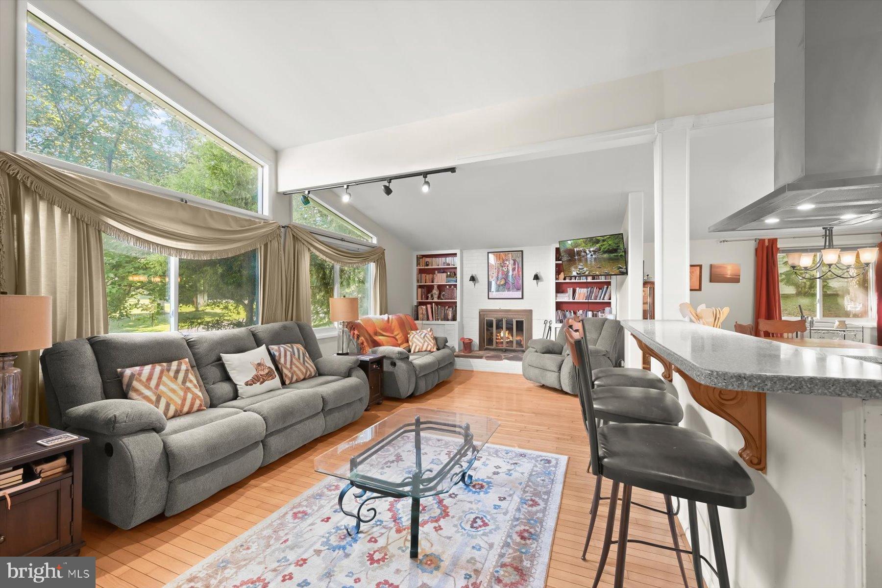 9233 Spring Valley Road Ellicott City, MD 21043 - Photo 4 of 45 a living room with furniture and a large window