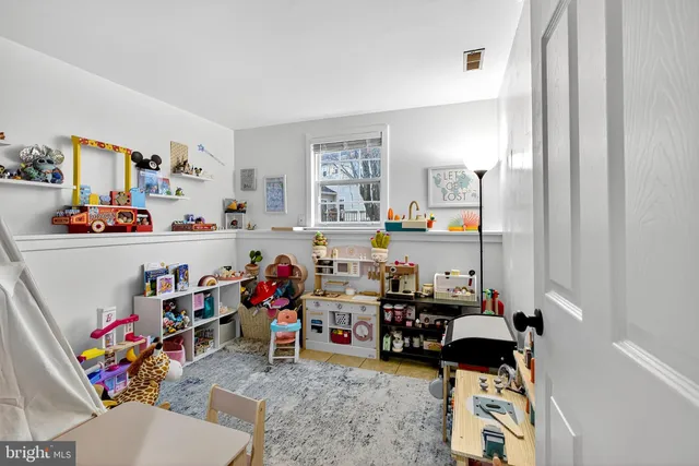 a room with furniture and a couch