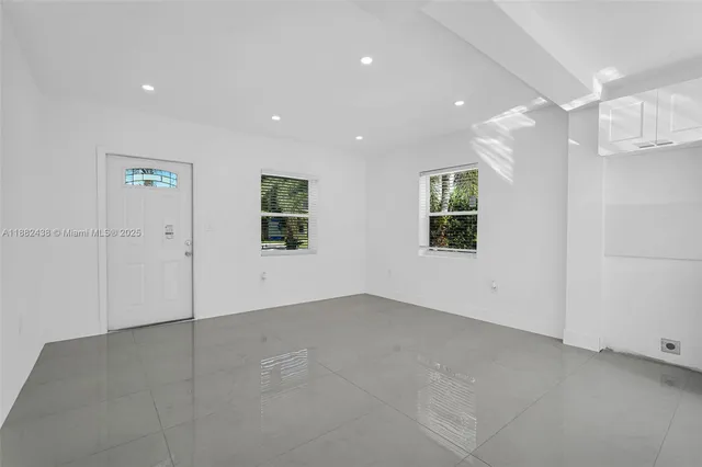 an empty room with windows