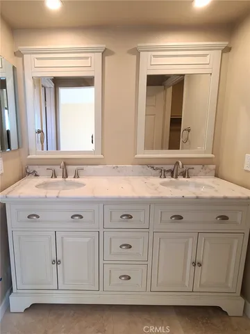 a view of a room that has a bed and a window