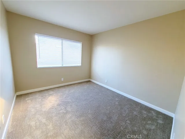 a view of a utility room with closet