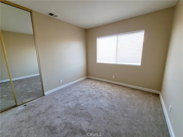 a view of a house with outdoor space and sitting area