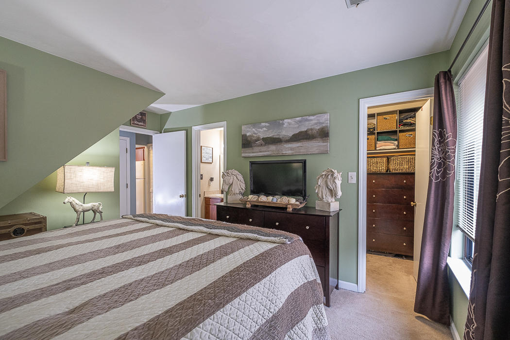 3327 Forest Ridge Road Roanoke, VA 24018 - Photo 16 of 31 a bedroom with a bed and a flat tv screen on dresser