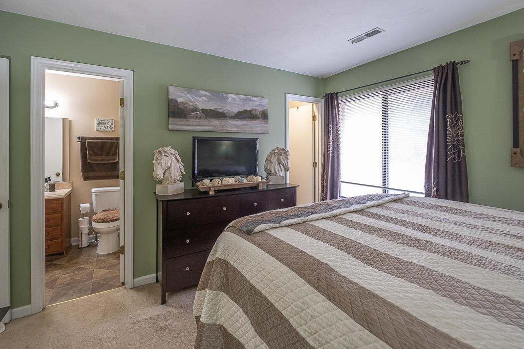 3327 Forest Ridge Road Roanoke, VA 24018 - Photo 17 of 31 a bedroom with a bed and a dresser
