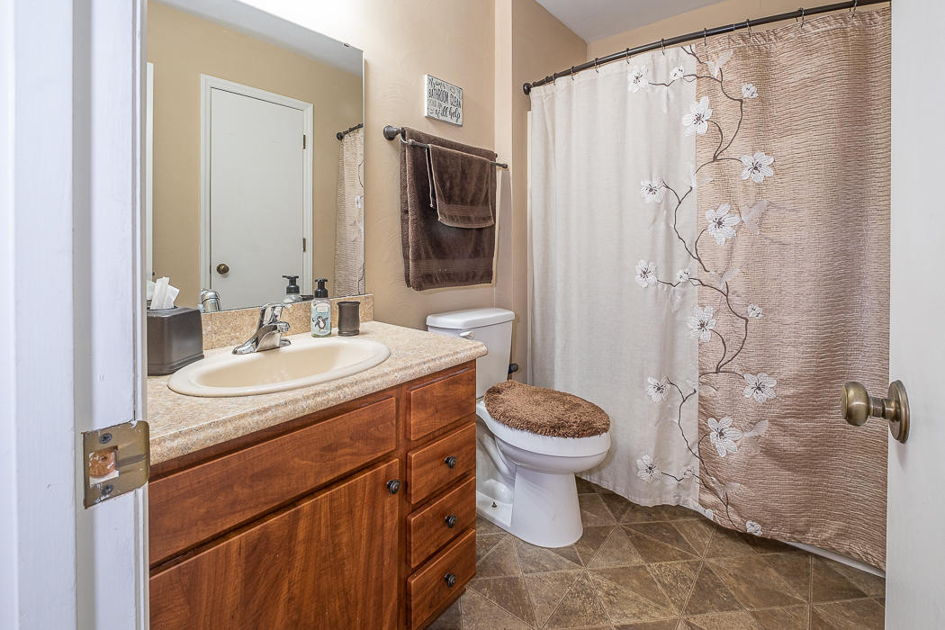 3327 Forest Ridge Road Roanoke, VA 24018 - Photo 18 of 31 a bathroom with a sink toilet and shower