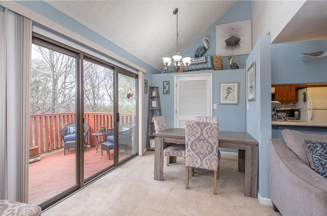 3327 Forest Ridge Road Roanoke, VA 24018 - Photo 5 of 31 a dining room with furniture a chandelier and window