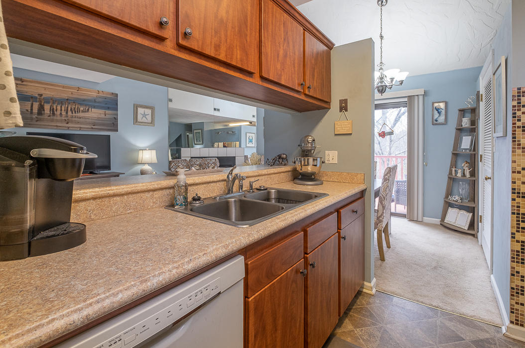3327 Forest Ridge Road Roanoke, VA 24018 - Photo 10 of 31 a kitchen with stainless steel appliances granite countertop a sink and a stove