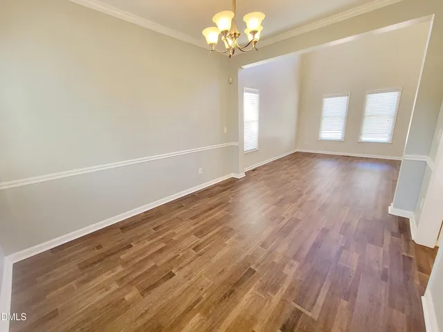 a kitchen with a sink a stove and refrigerator