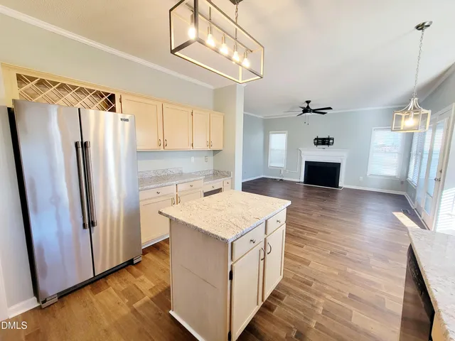 a view of a kitchen with a sink