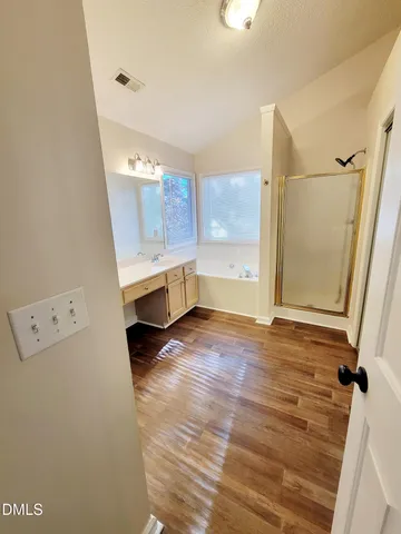 a view of a room that has a window in it