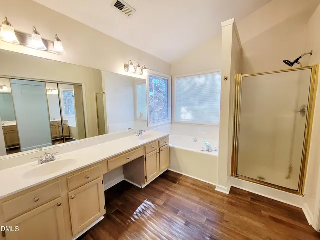 a room with a sink cabinets and utility room