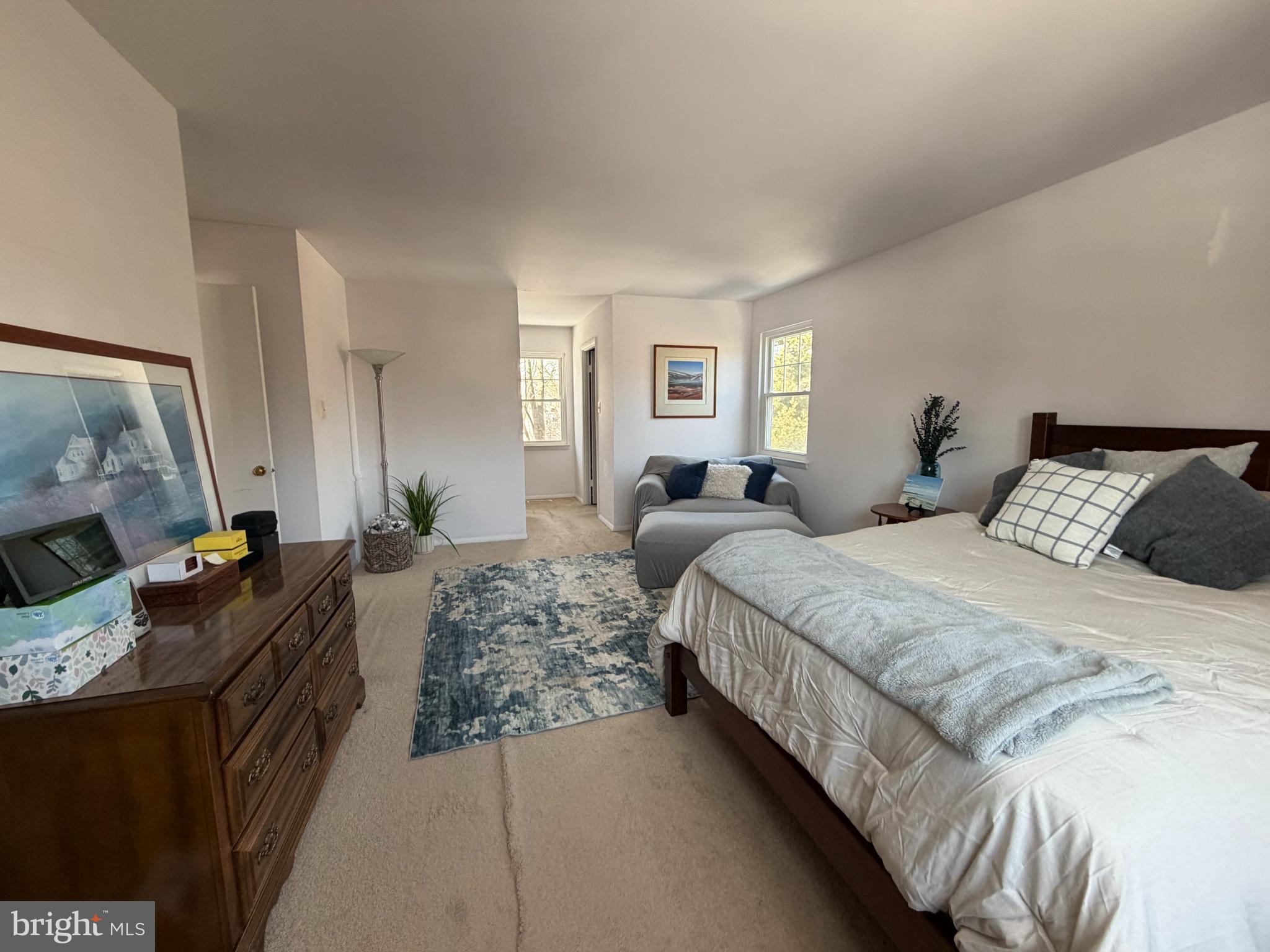 18812 Jade Court Gaithersburg, MD 20879 - Photo 13 of 32 a bedroom with bed couch and window