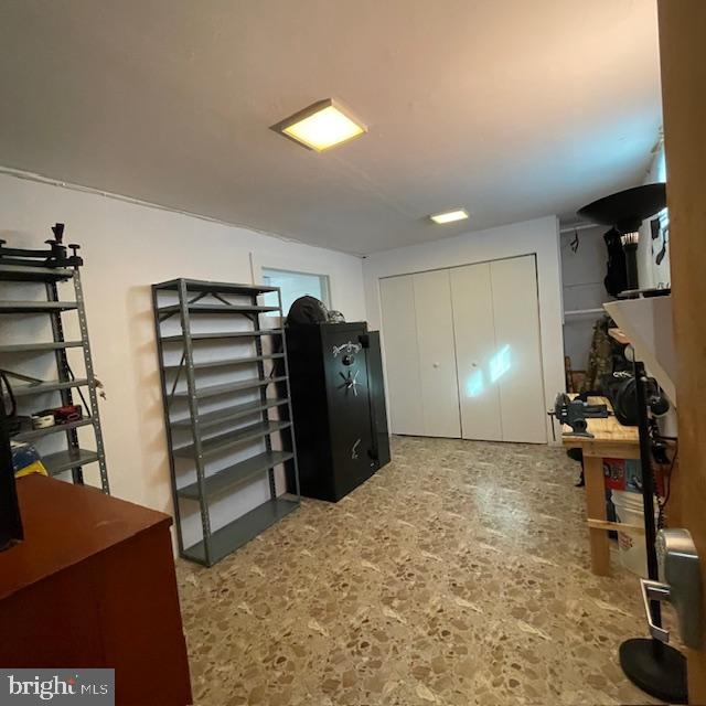 18812 Jade Court Gaithersburg, MD 20879 - Photo 17 of 27 a view of a livingroom with furniture and storage