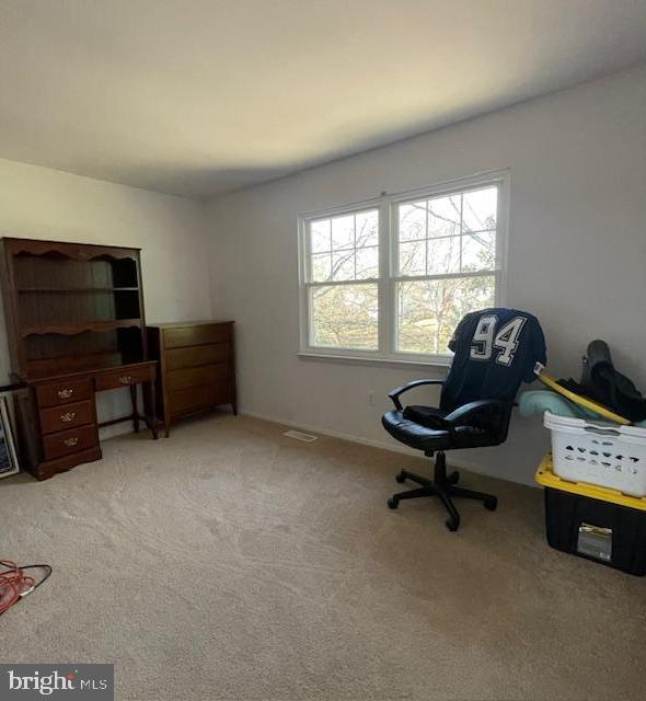 18812 Jade Court Gaithersburg, MD 20879 - Photo 21 of 32 a living room with furniture and a flat screen tv