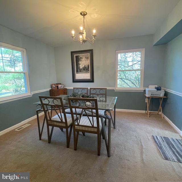 18812 Jade Court Gaithersburg, MD 20879 - Photo 5 of 27 a view of a dining room with furniture and window