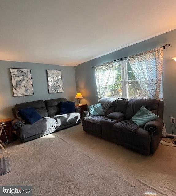18812 Jade Court Gaithersburg, MD 20879 - Photo 6 of 27 a living room with furniture and a large window