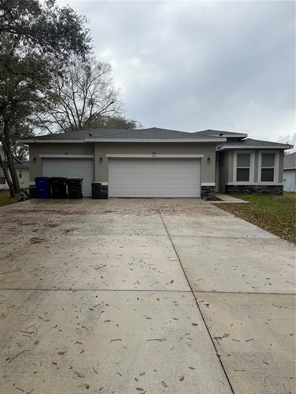 310 Grape Avenue St. Cloud, FL 34769 - Photo 1 of 27 a house with a outdoor space