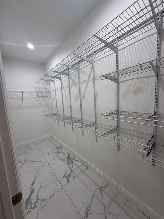 310 Grape Avenue St. Cloud, FL 34769 - Photo 19 of 27 a bathroom with a shower