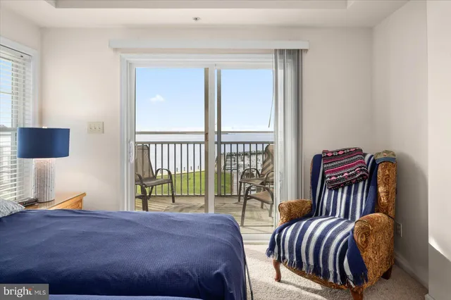 a bathroom with a bathtub and a toilet