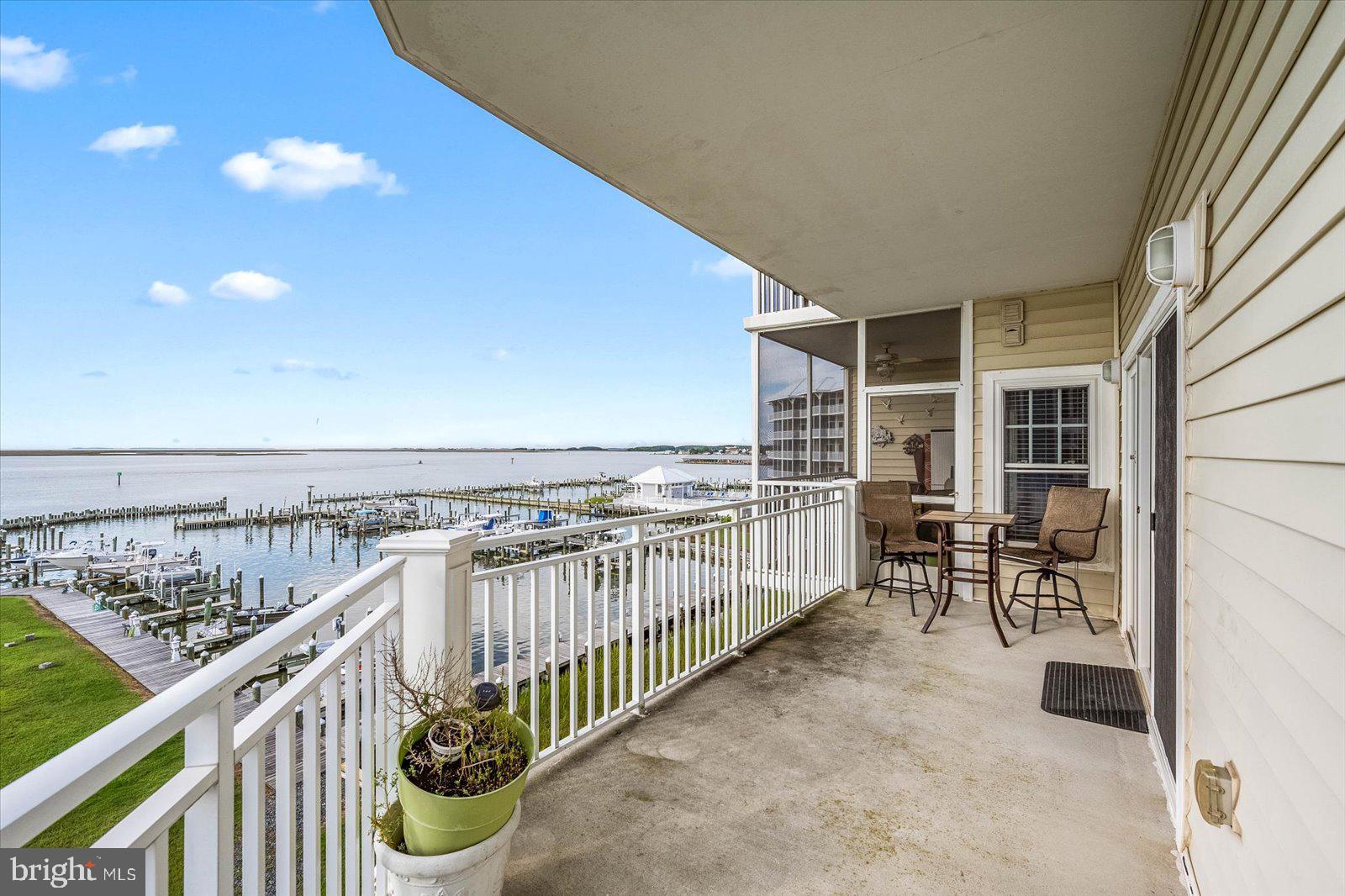 102 Williams Street, Unit 311 Crisfield, MD 21817 - Photo 36 of 57 a balcony with furniture